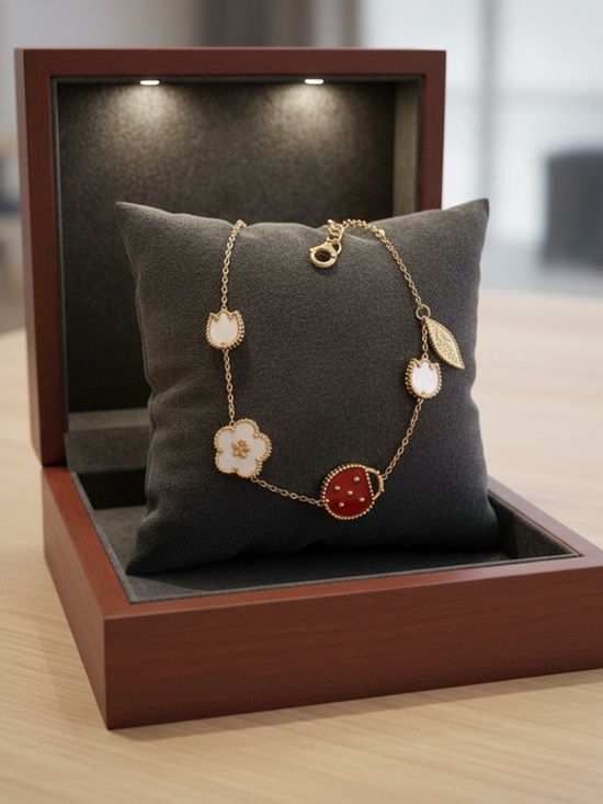 Jewelry - Elegant Gold Chain Bracelet with White Flower and Red Accent